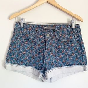 Floral printed levi’s jean shorts.  Size 6